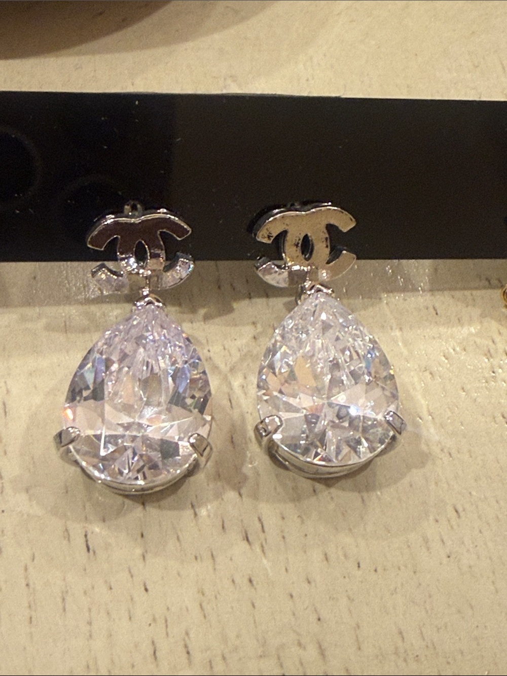 Designer style Silver Logo Drop Earrings with Clear Teardrop Crystals